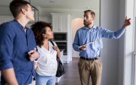 A real estate agent showing a home