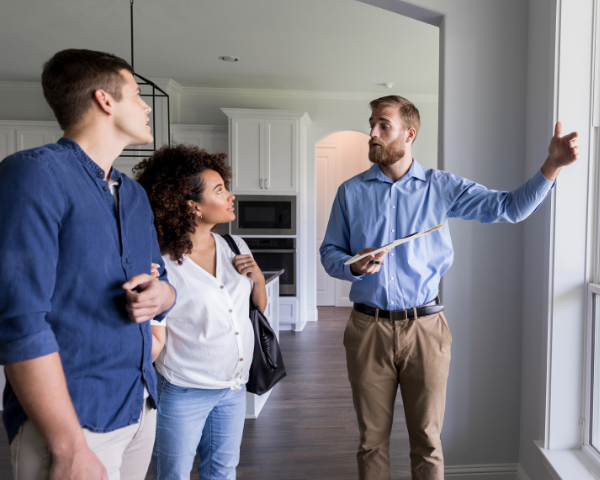 A real estate agent showing a home