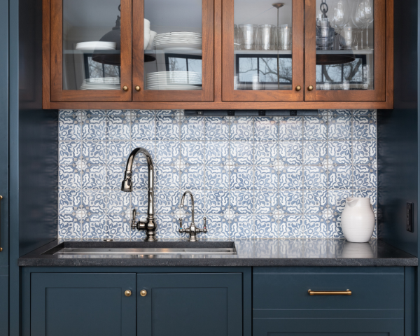 renovated kitchen bold paint and backsplash