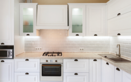 white kitchen cabinets with bronze drawer pulls