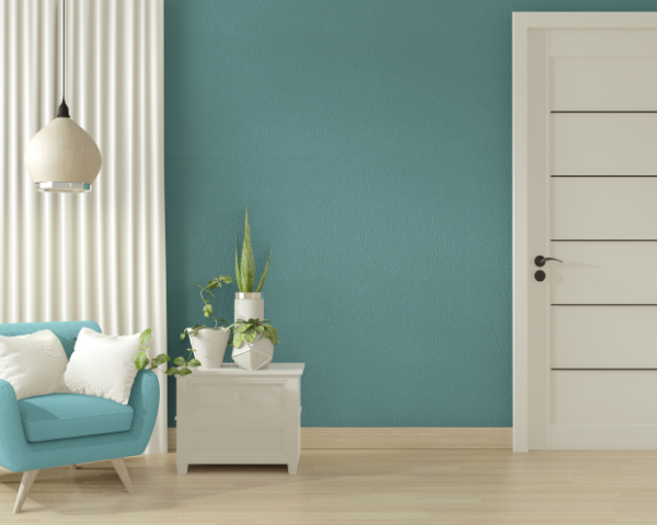 living room wall with teal paint and white accents
