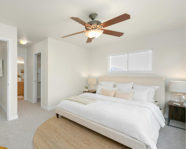 bedroom with warm neutral wall paint