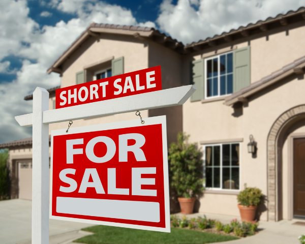 Home with a Short Sale For Sale Signage